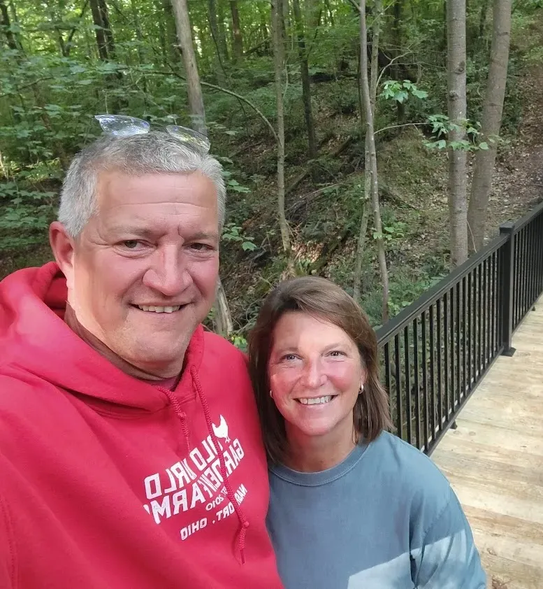 Jim and Mary hard at work on the farm.